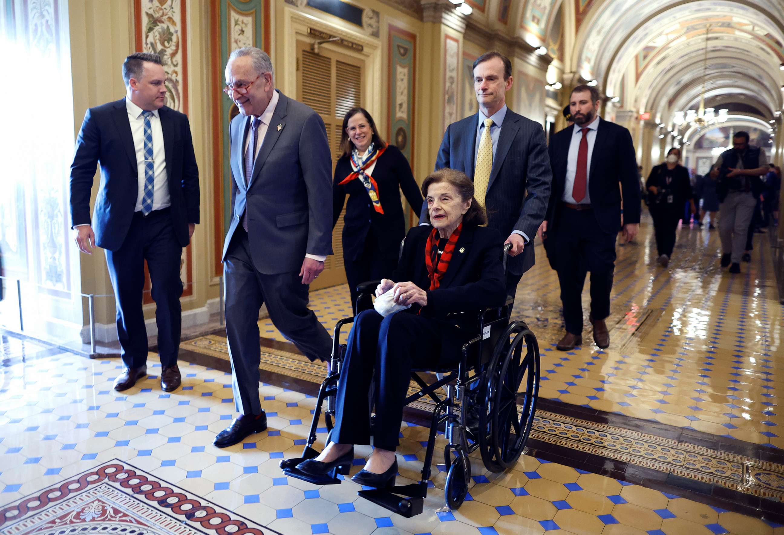 PHOTO: Sen. Dianne Feinstein is escorted by Senate Majority Leader Chuck Schumer as she arrives at the U.S. Capitol following a long absence due to health issues, May 10, 2023, in Washington, D.C.