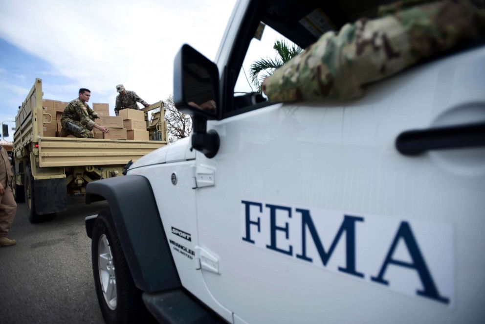 PHOTO: Department of Homeland Security personnel deliver supplies to Santa Ana community residents in the aftermath of Hurricane Maria in Guayama, Puerto Rico, Oct. 5, 2017.
