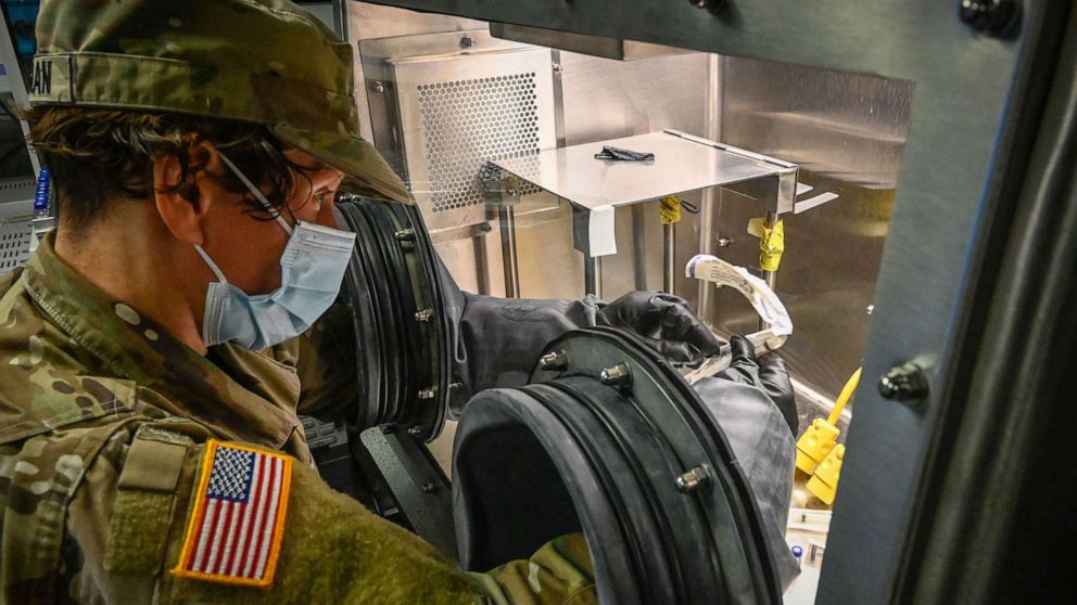 PHOTO: U.S. Army Capt. Joyce Avedisian prepares to conduct sample analysis on suspected fentanyl in an Analytical Laboratory System vehicle outside the Sport and Medical Sciences Academy in Hartford, Conn., Jan. 13, 2022.