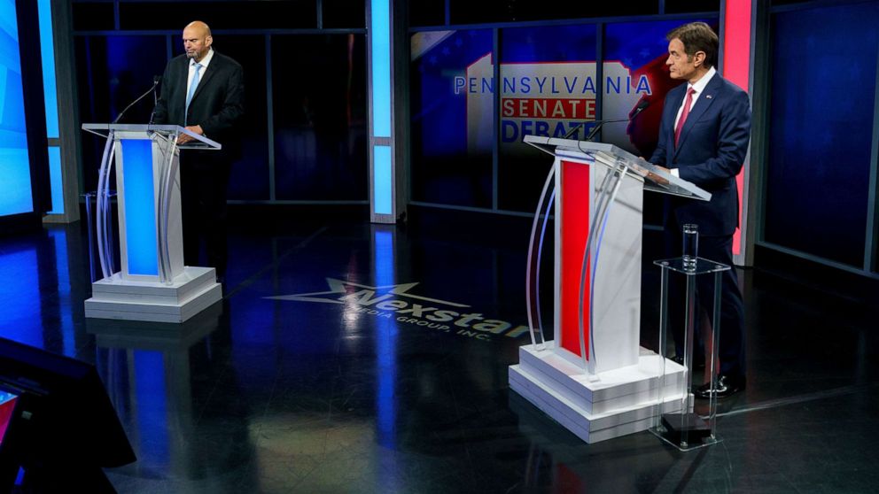 PHOTO: A handout photo made available by abc27 shows Democratic candidate Lt. Gov. John Fetterman (L) and Republican Pennsylvania Senate candidate Dr. Mehmet Oz (R) prior to the Nexstar Pennsylvania Senate Debate in Harrisburg, Penn., Oct. 25, 2022.
