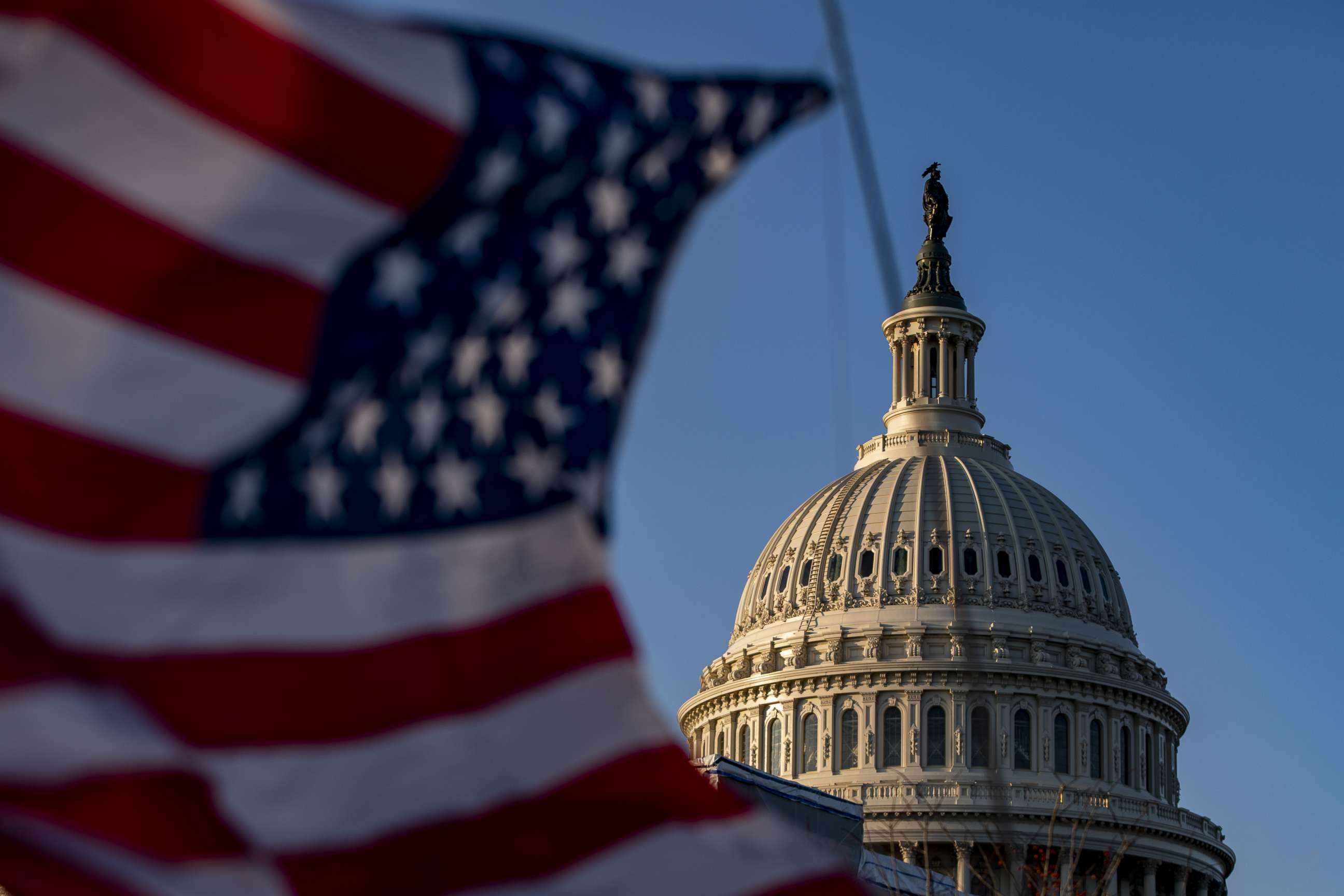 PHOTO: A U.S. flag flies near the dome of the U.S. Capitol on Dec. 18, 2019, in Washington.