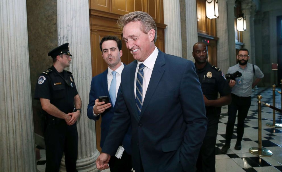 PHOTO: Sen. Jeff Flake, R-Ariz., heads to the Senate floor for the confirmation vote of Supreme Court nominee Brett Kavanaugh, on Capitol Hill, Oct. 6, 2018.