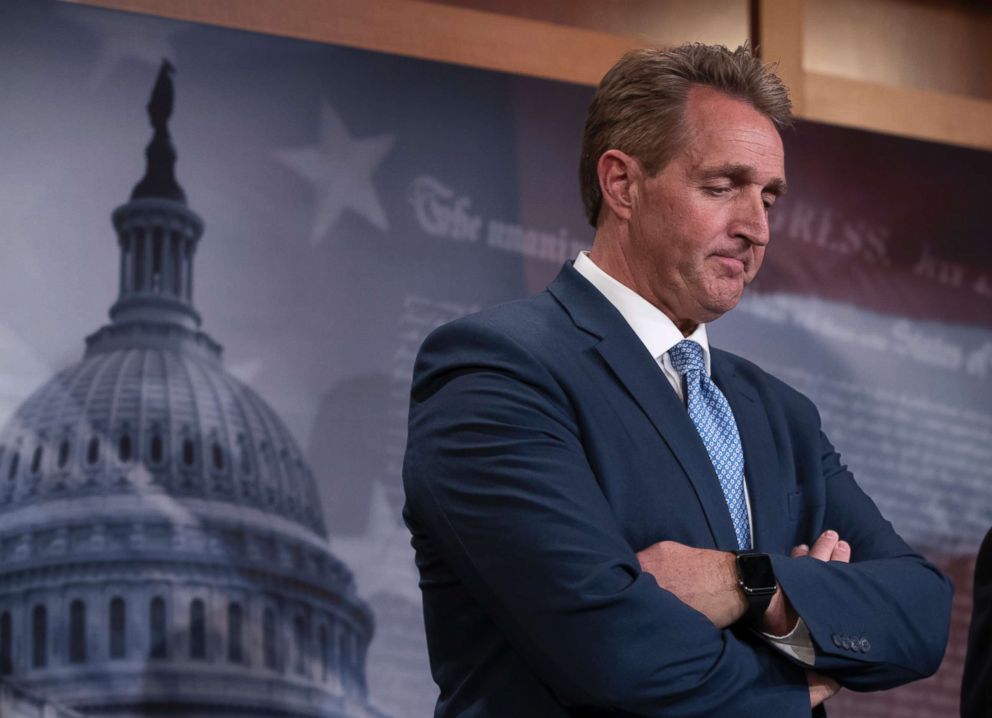 PHOTO: Sen. Jeff Flake, R-Ariz., talks to reporters after making a speech on the Senate floor on Capitol Hill, July 19, 2018.