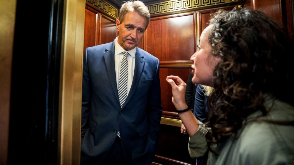 PHOTO: Ana Maria Archila confronts Senator Jeff Flake in an elevator in Washington ahead of a Senate Judiciary Committee meeting on the Supreme Court nomination of Brett Kavanaugh, Sept. 28, 2018.