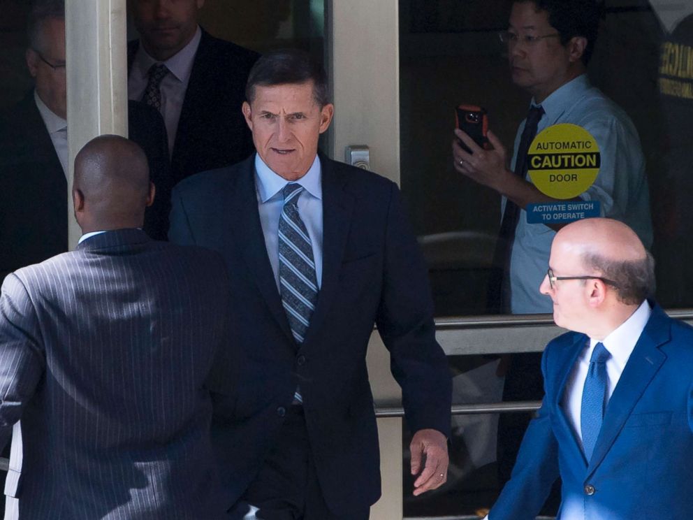 PHOTO: Gen. Michael Flynn, center, with his attorney, Robert Kelner, right, leaves Federal Court in Washington, DC, December 1, 2017 after pleading guilty to one count of lying to the FBI about his back-channel negotiations with the Russian ambassador.