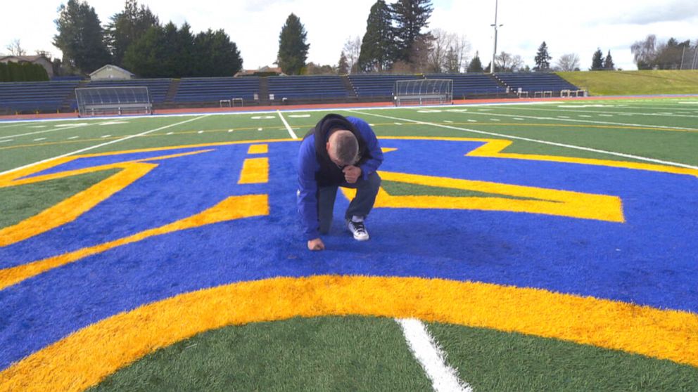 PHOTO: A coach's post-game prayers at the 50 yard-line on Bremerton High School's football field divided the small community outside of Seattle.
