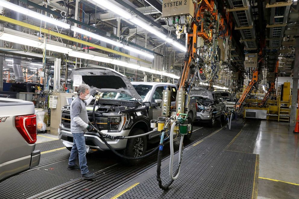 PHOTO: An employee works on the 40 millionth Ford Motor Co. F-Series truck on the assembly line at the Ford Truck Plant in Dearborn, Mich., Jan. 26, 2022.