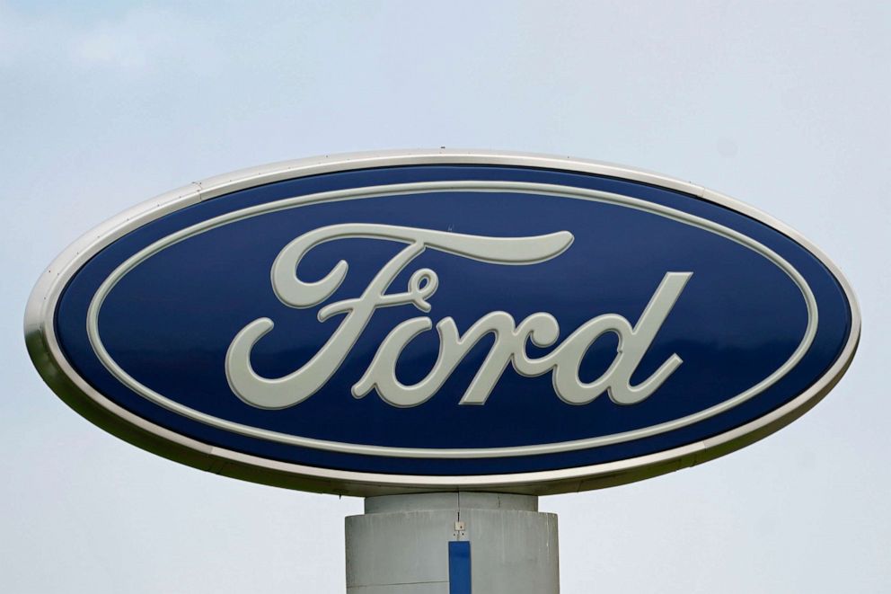PHOTO: A Ford logo is seen on signage at Country Ford in Graham, N.C., July 27, 2021.