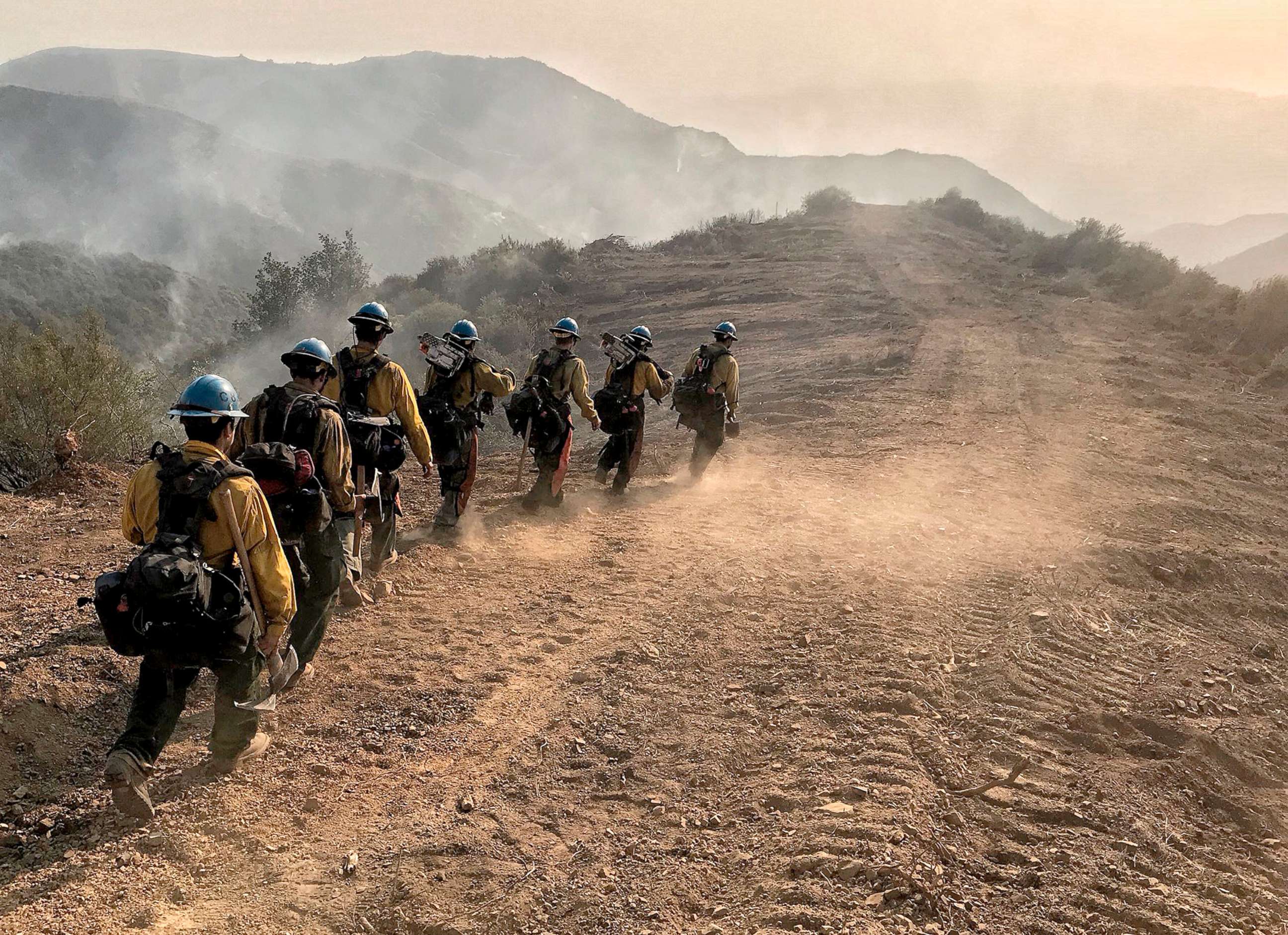PHOTO:U.S. Forest Service hot shot crew members head down a fire break to work off E. Camino Cielo in Santa Barbara, Calif., Dec. 17, 2017.Thousands of firefighters tried to shield area communities from one of the biggest wildfires in California history. 
