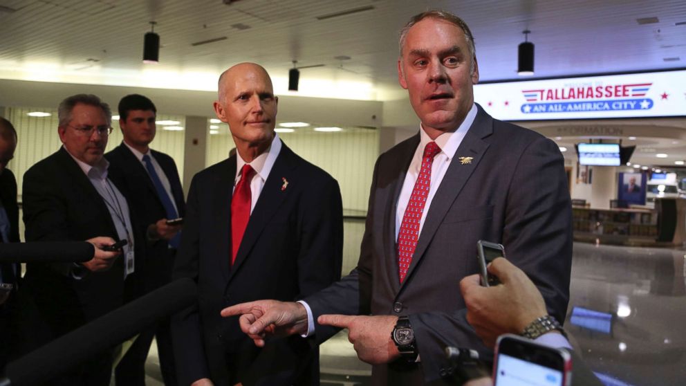 Florida Governor Rick Scott, left, and U.S. Department of the Interior Secretary Ryan Zinke, announce there will be no new offshore drilling in the State of Florida. Both met at the Tallahassee International Airport, Jan. 9, 2018.