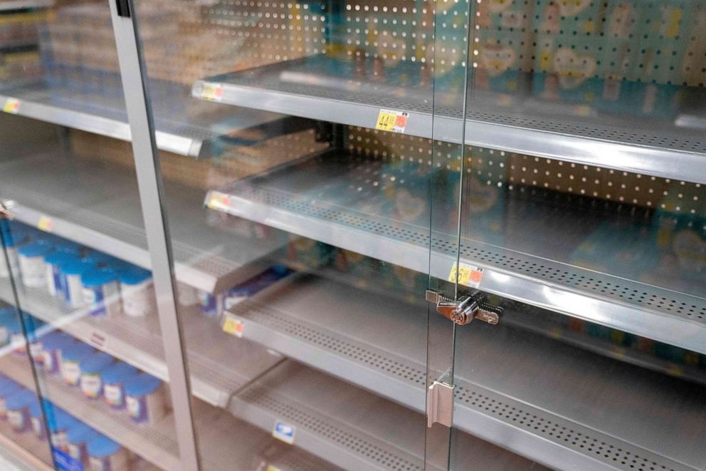 PHOTO: Grocery store shelves where baby formula is typically stocked are locked and nearly empty in Washington, DC, on May 11, 2022.