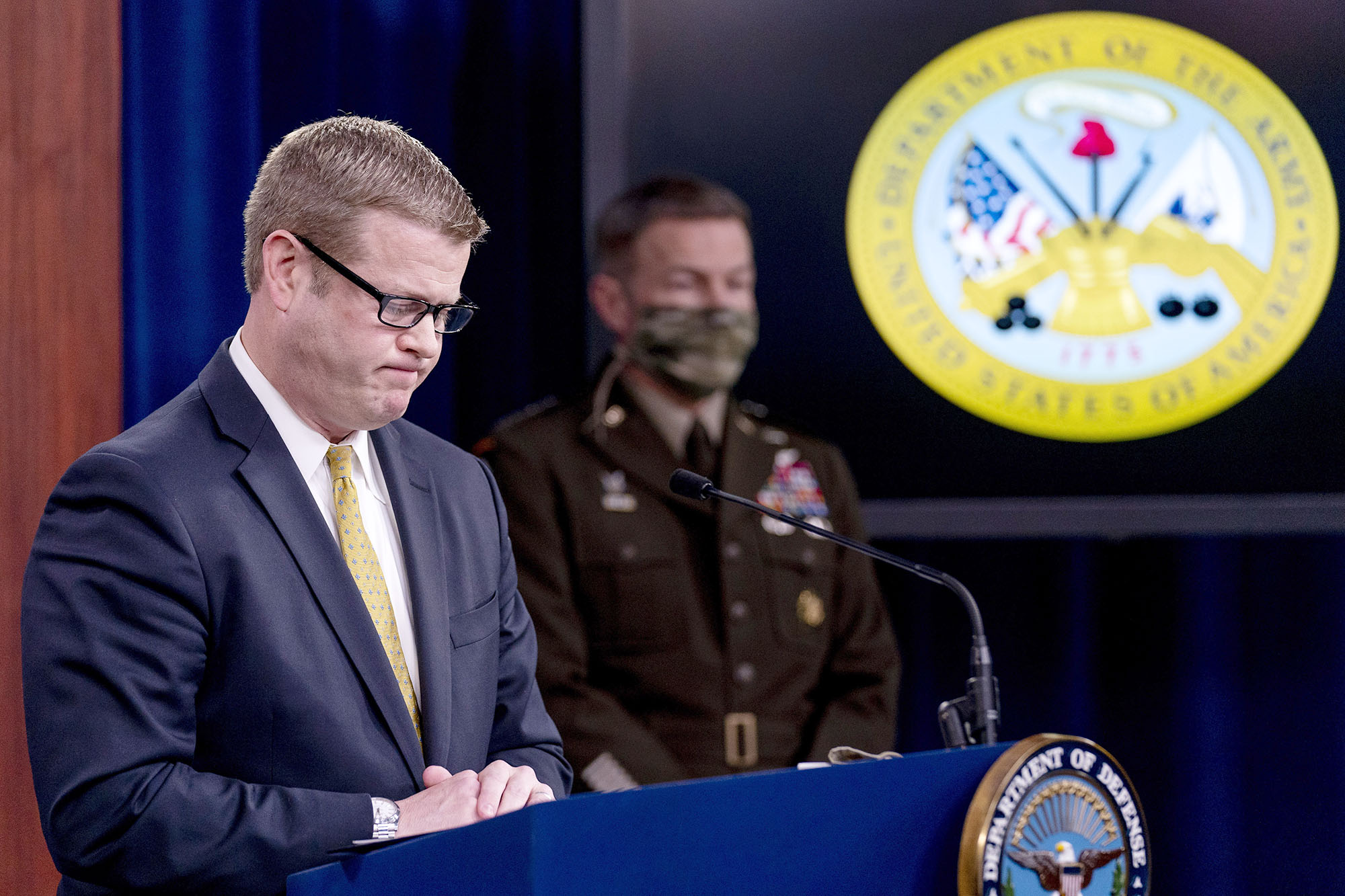 PHOTO: Secretary of the Army Ryan McCarthy accompanied by Gen. James McConville, Chief of Staff of the Army pauses while speaking about an investigation into Fort Hood, Texas at the Pentagon, Dec. 8, 2020