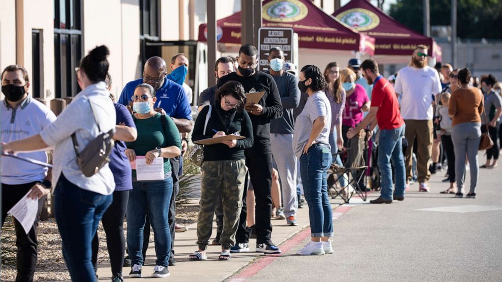 PHOTO: In this Oct. 29, 2020, file photo, people wait in line to vote at Tarrant County Elections Center on the last day of early voting in Fort Worth, Texas.