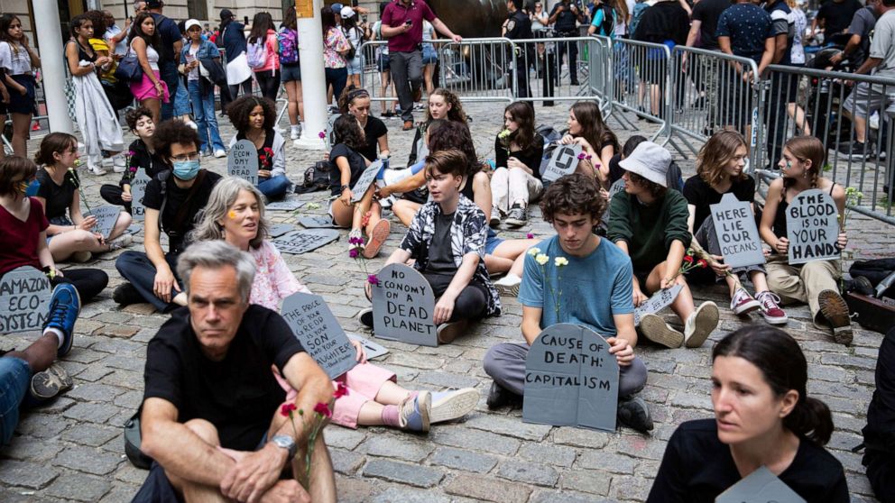 PHOTO: Fridays for Future New York City (FFF NYC) activists participated in a climate die-in at Bowling Green Park, New York City on June 10, 2022 calling on major banks and asset managers to take concrete steps to divest from fossil fuels.