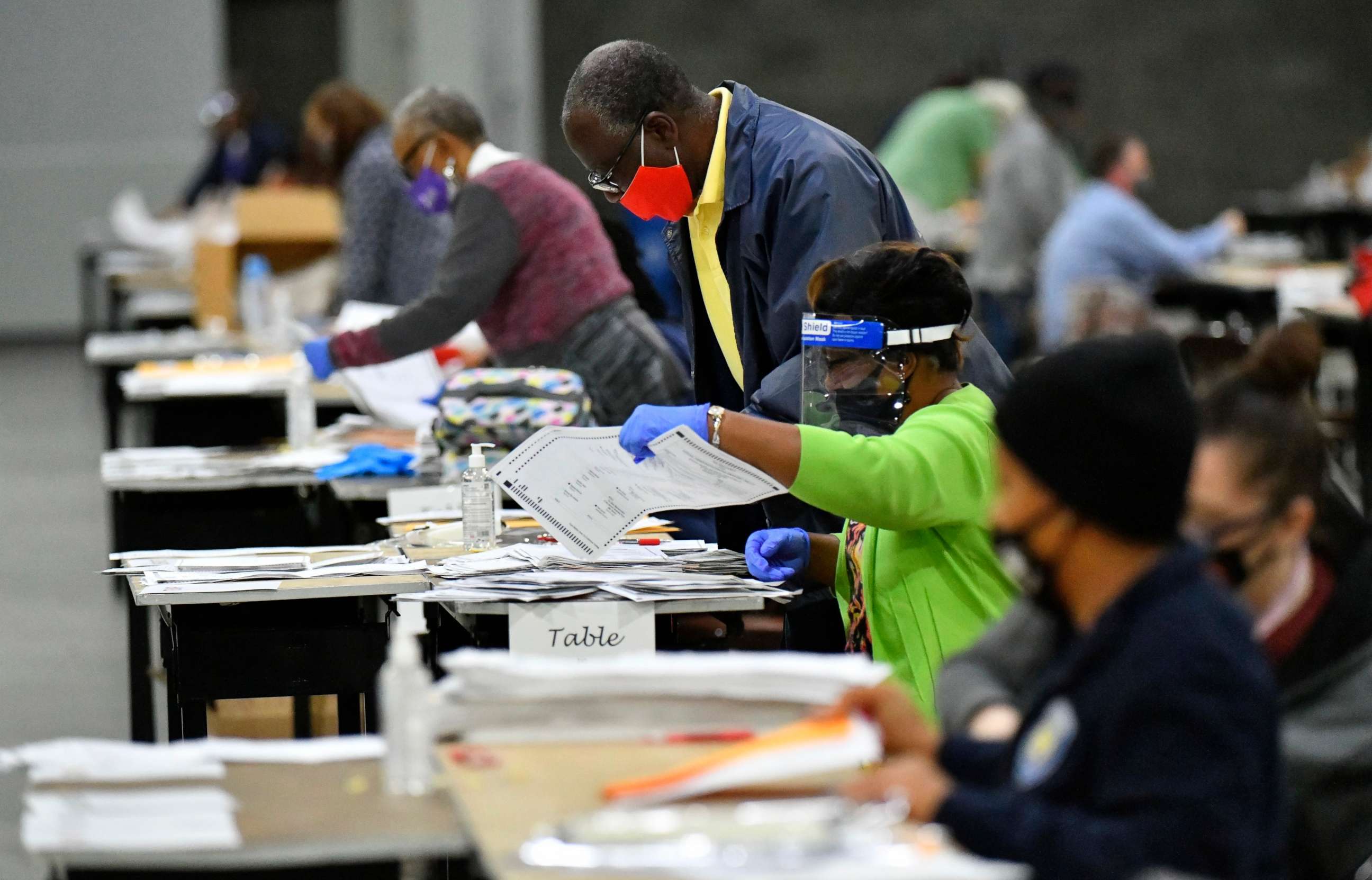 PHOTO: Election workers in Fulton County began working through a recount of ballots Saturday, Nov. 14, 2020, in Atlanta.