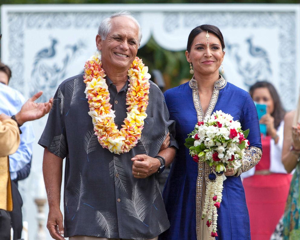 PHOTO: Congresswoman Tulsi Gabbard's father Mike Gabbard walks her down the aisle on her wedding day in April, 2015.
