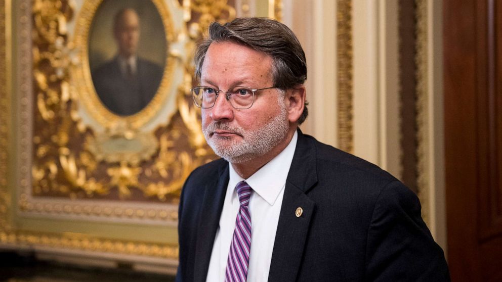 PHOTO: Sen. Gary Peters leaves the Senate Democrats' policy lunch in the Capitol on Sept. 10, 2019.