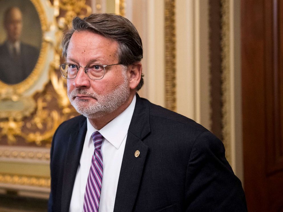 PHOTO: Sen. Gary Peters leaves the Senate Democrats policy lunch in the Capitol on Sept. 10, 2019.