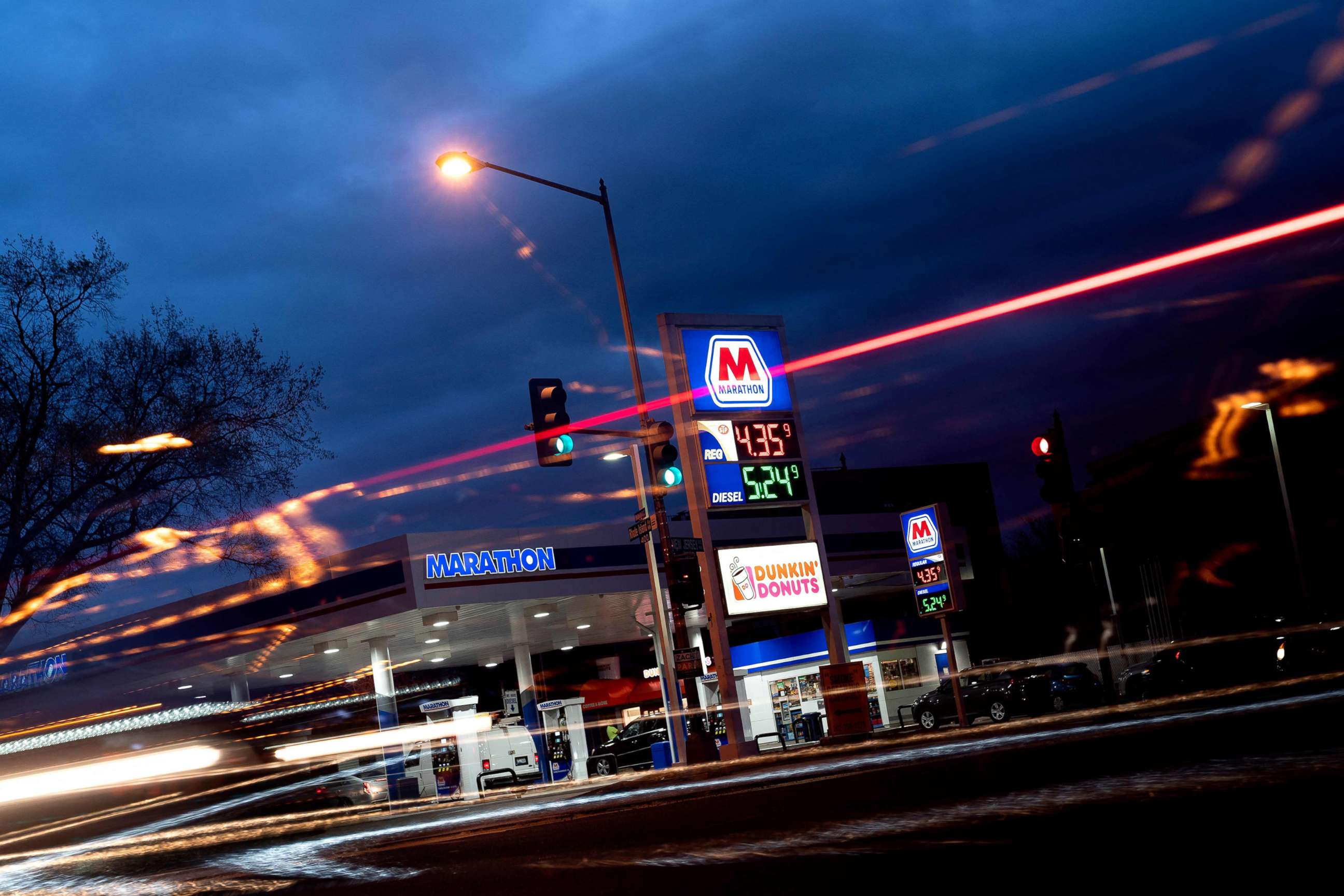PHOTO: A vehicle drives past a Marathon gas station in Washington, DC, on March 31, 2022.