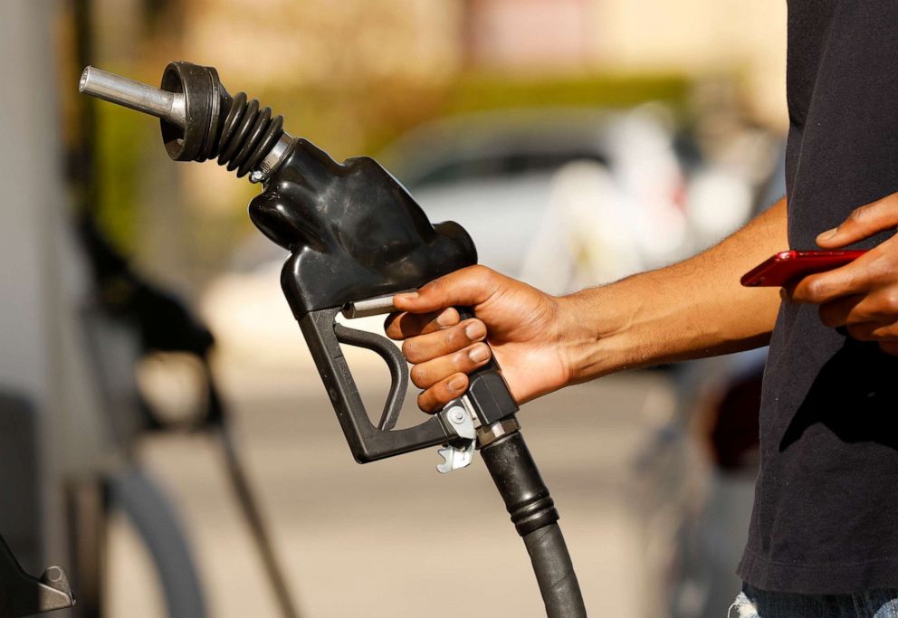 PHOTO: A person pumps gas at a Shell gas station in Los Angeles, Nov. 15, 2021.