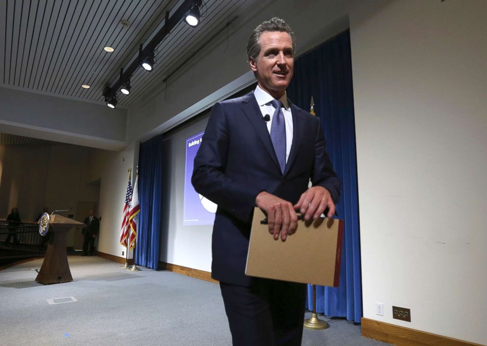 PHOTO: California Gov. Gavin Newsom leaves the auditorium stage after presenting his first state budget during a news conference, Jan. 10, 2019, in Sacramento, Calif.