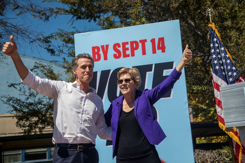 PHOTO: California Gov. Gavin Newsom and Sen. Elizabeth Warren take to the stage at a "Stop the Republican Recall" rally at Culver City High School on Sept. 4, 2021, in Culver City, Calif.