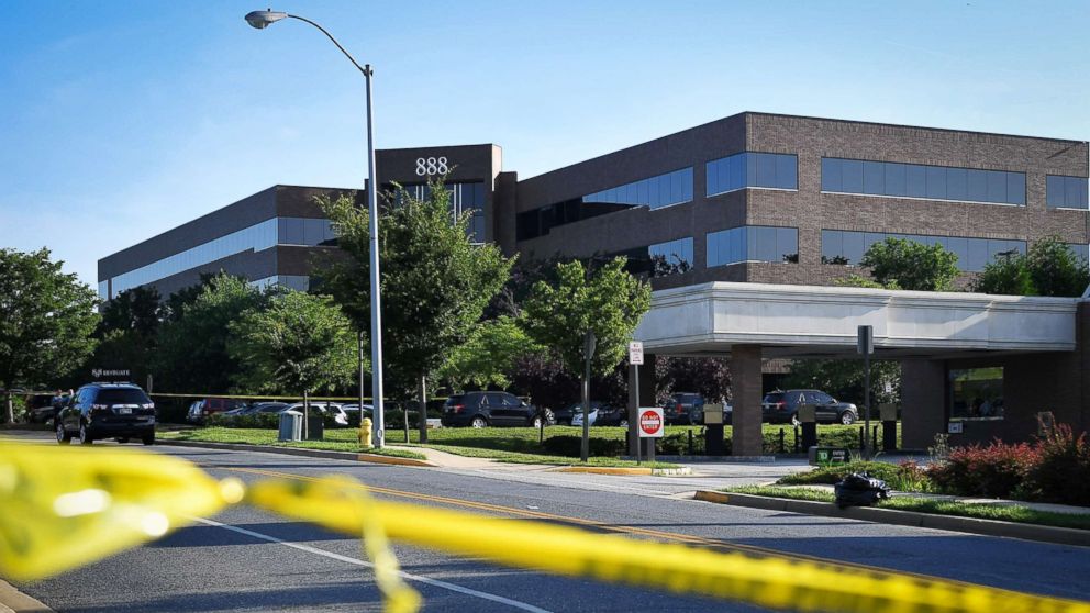 PHOTO: Police tape blocks access from a street leading to the building complex where The Capital Gazette is located in Annapolis, Md., June 29, 2018.