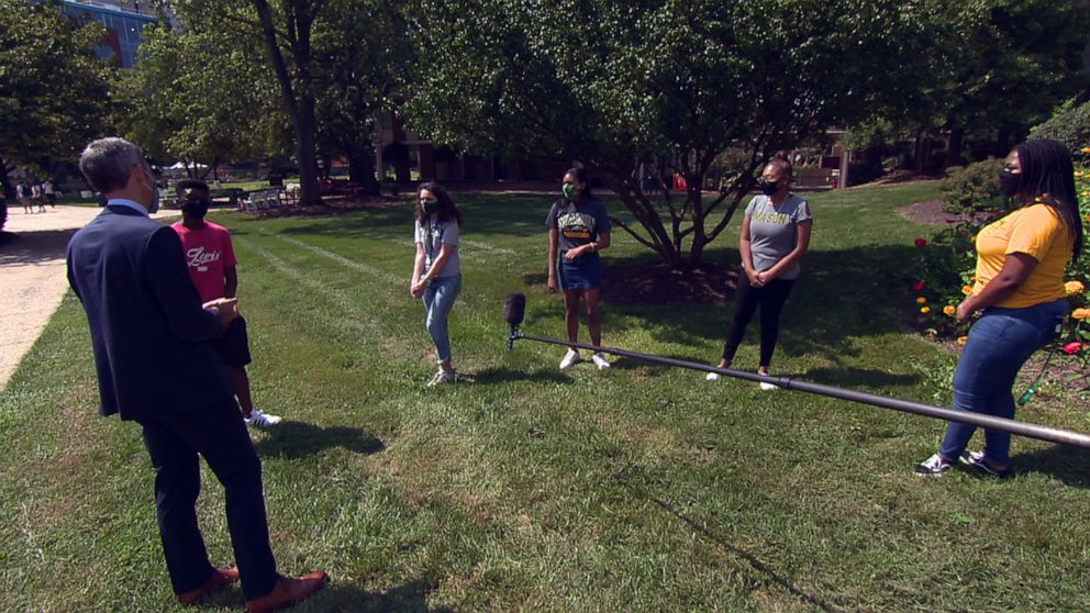 PHOTO: Students have returned to campus at George Mason University in Fairfax, Va., under strict requirement to wear face masks and remain socially distant.