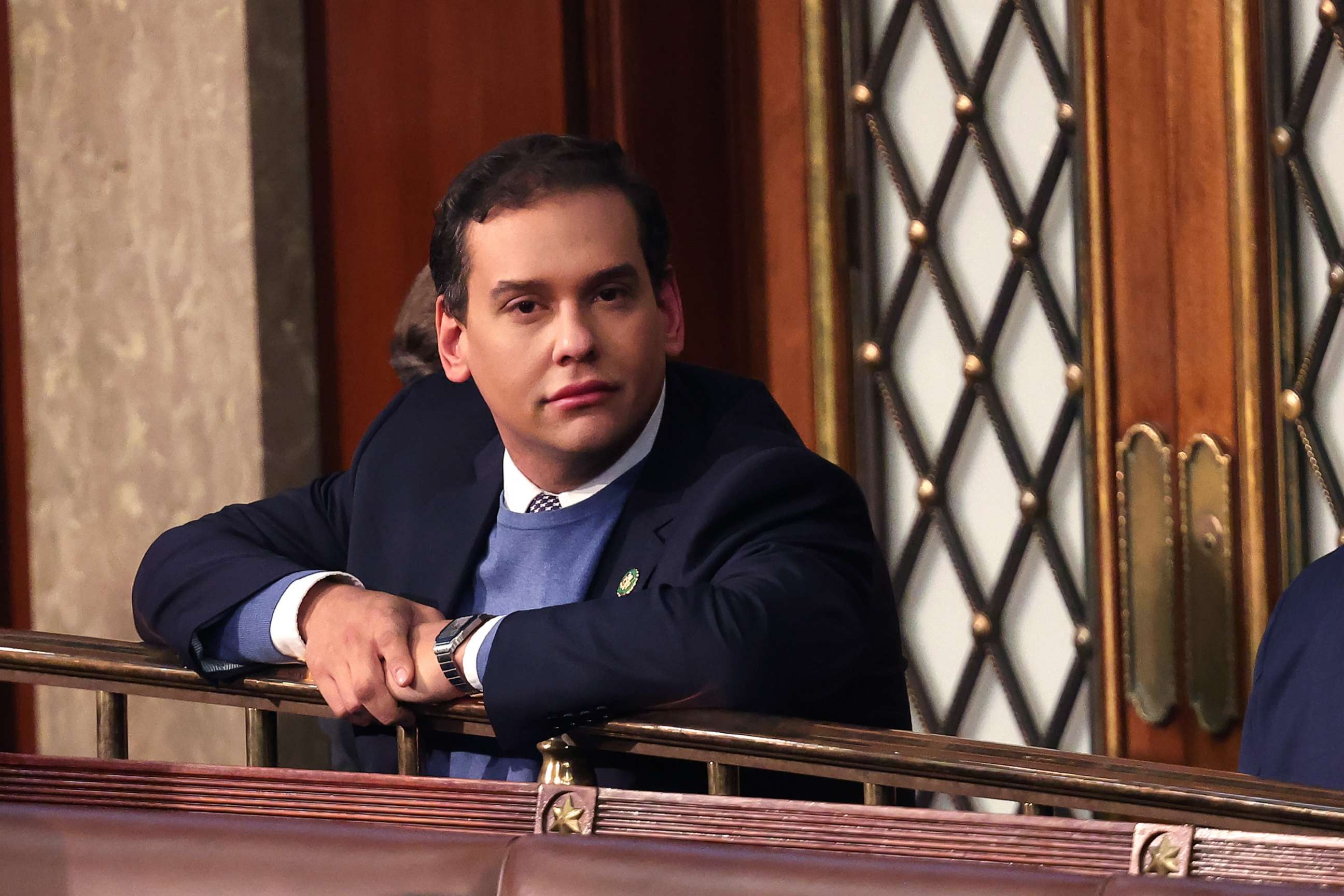 PHOTO: Rep. George Santos waits as fellow Representatives cast their votes for Speaker of the House on the first day of the 118th Congress in the House Chamber, Jan. 3, 2023, in Washington.