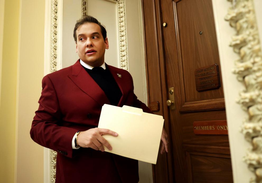 PHOTO: Rep. George Santos walks into the House Republican cloakroom at the Capitol, Nov. 28, 2023.