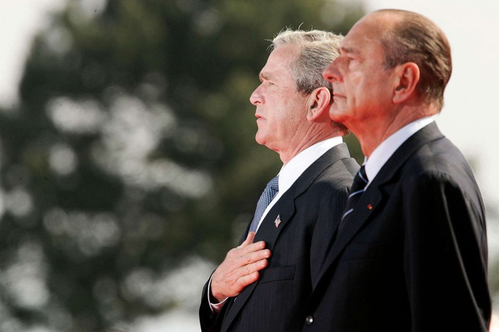 PHOTO: President George W. Bush and French President Jacques Chirac attend ceremonies marking the 60th anniversary of the D-Day invasion in World War II at Omaha Beach June 6, 2004 in Colleville Sur Mer, France.