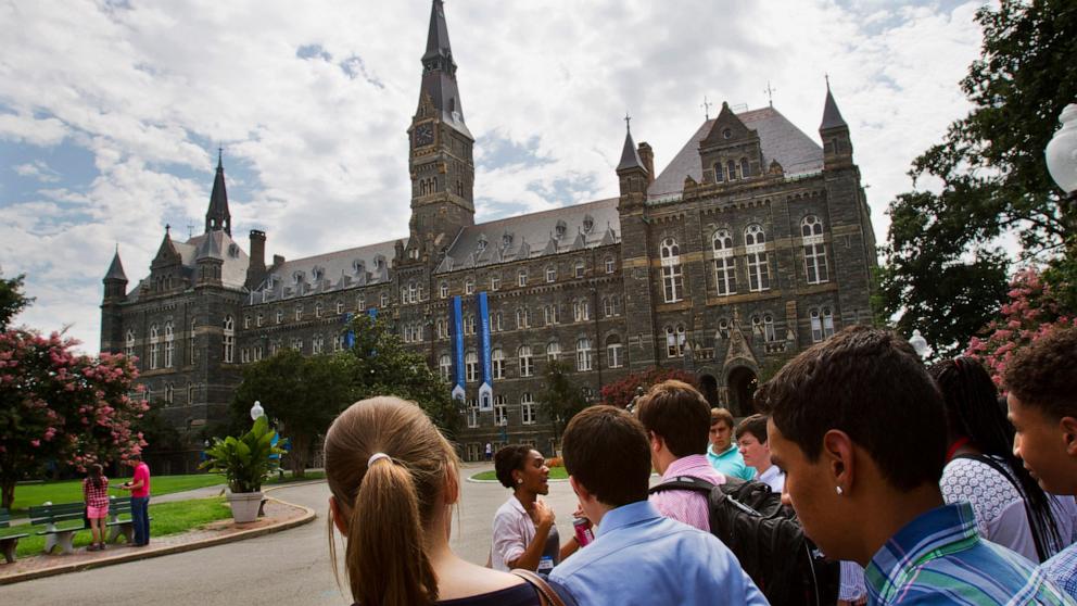 PHOTO: Prospective students tour Georgetown University's campus in Washington.