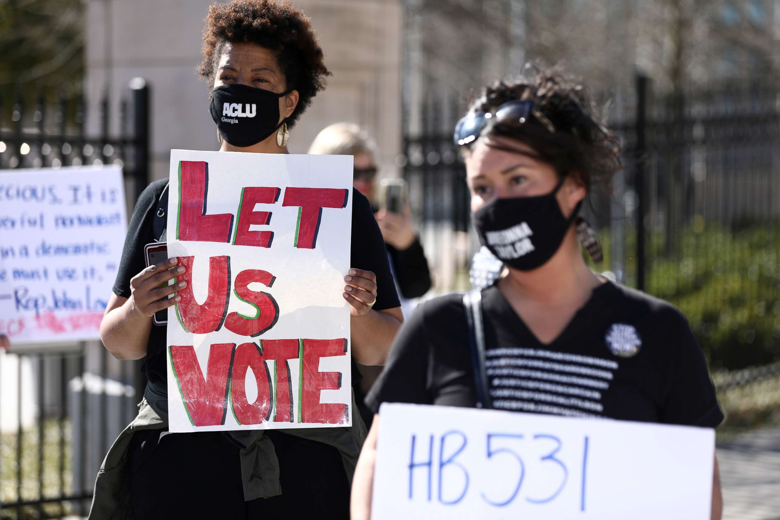 PHOTO: Protesters gather outside of the Georgia State Capitol to protest HB 531, which would place tougher restrictions on voting in Georgia, in Atlanta, Ga., March 4, 2021.