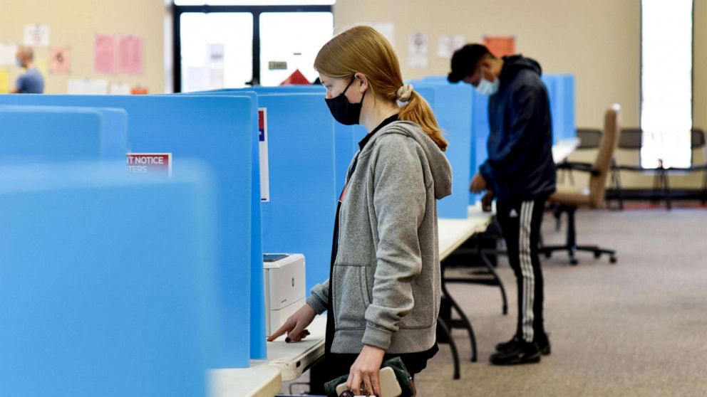PHOTO: Voters cast their ballots in Chamblee, Ga., during the Georgia runoffs elections, Jan. 5, 2020.