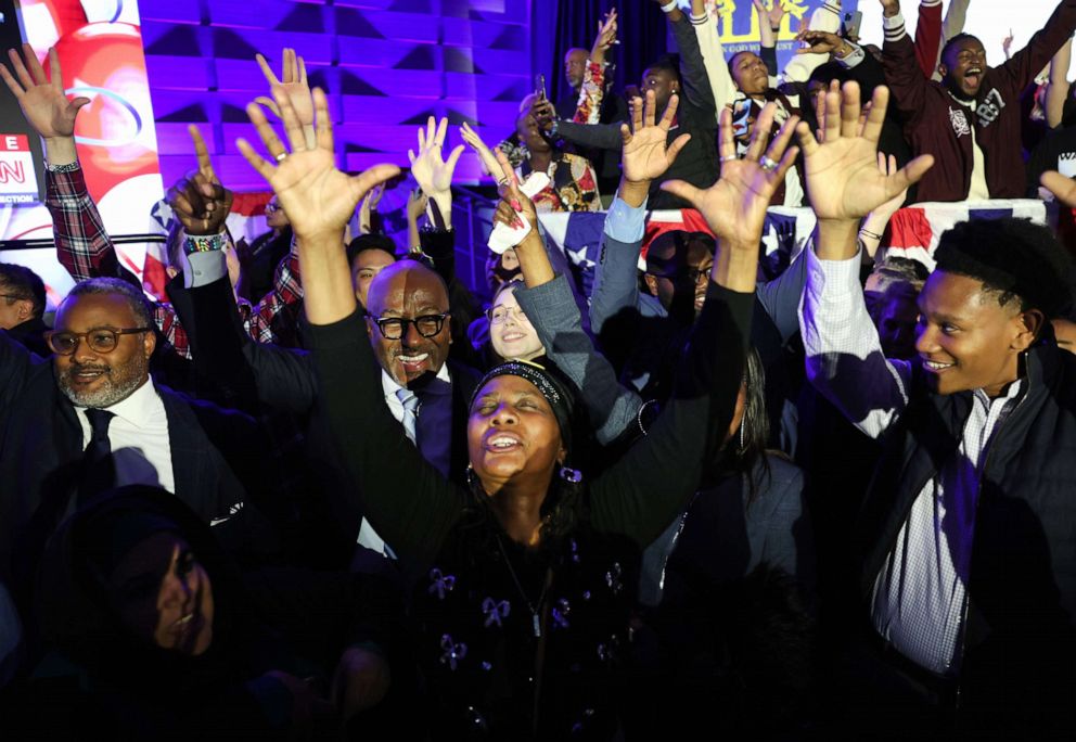 PHOTO: Supporters cheer as the Georgia Senate runoff election is called for Sen. Raphael Warnock at the Warnock election right watch party, December 6, 2022, in Atlanta.