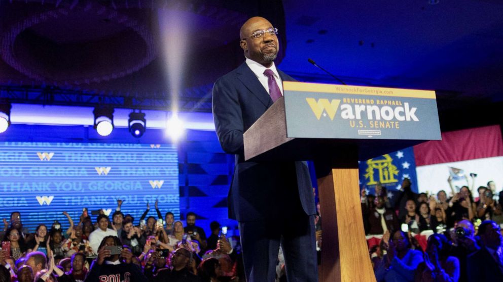 PHOTO: U.S. Senator Raphael Warnock speaks during an election night party in Atlanta, Dec. 6, 2022.