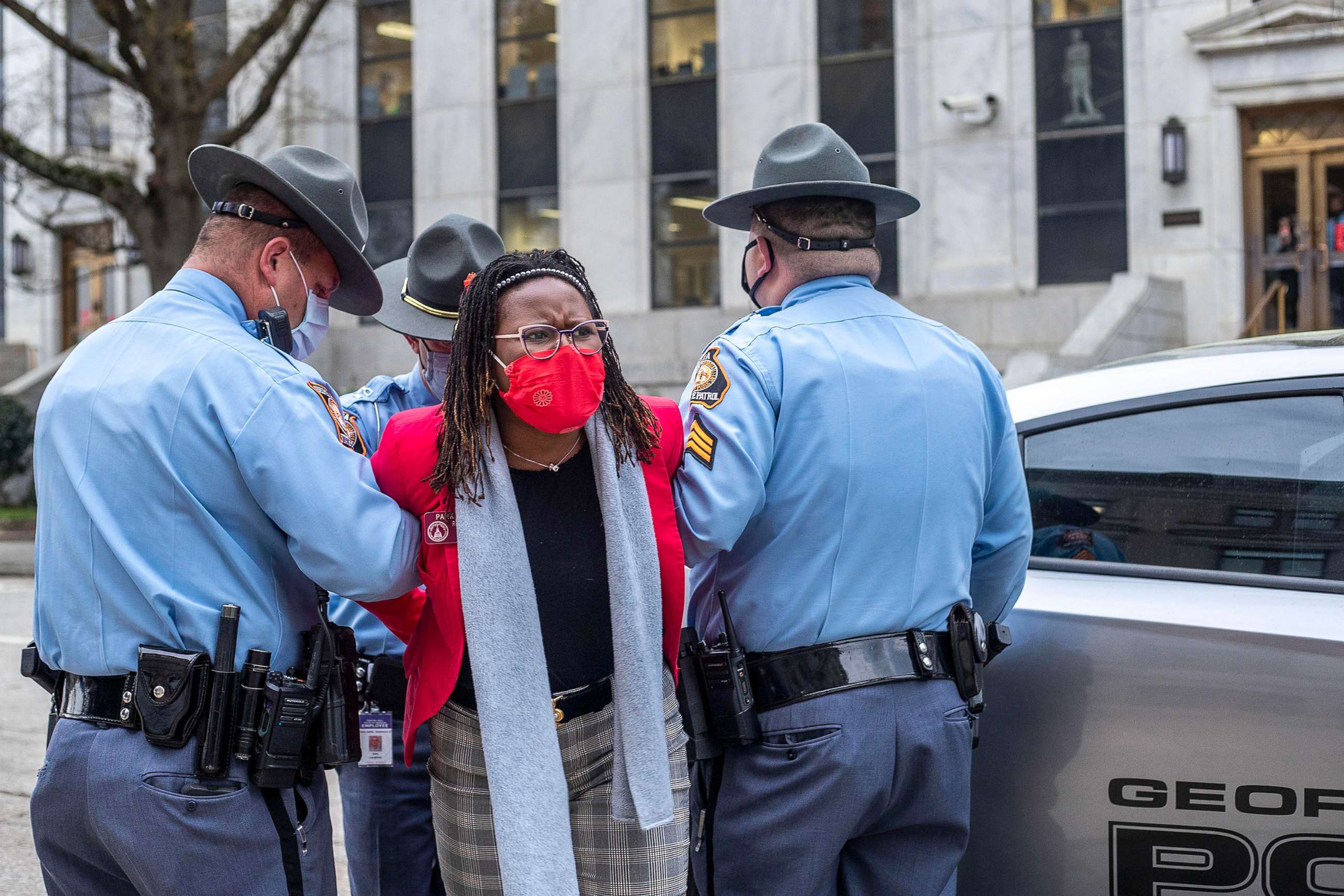 PHOTO: State Rep. Park Cannon is placed into the back of a Georgia State Capitol patrol car after being arrested by Georgia State Troopers at the Georgia State Capitol Building in Atlanta, March 25, 2021.