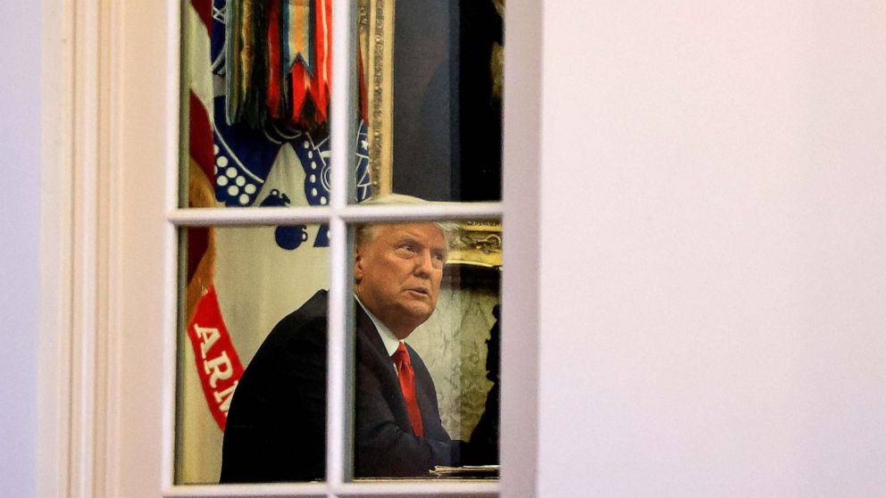 PHOTO: President Donald Trump sits in the Oval Office of the White House in Washington, Nov. 13, 2020. 