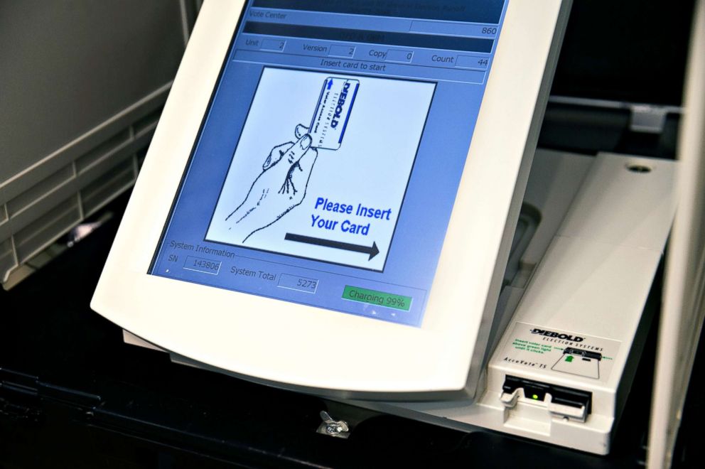 PHOTO: An electronic voting machine sits in a privacy booth at a polling location during the Georgia primary runoff elections in Atlanta on July 24, 2018.