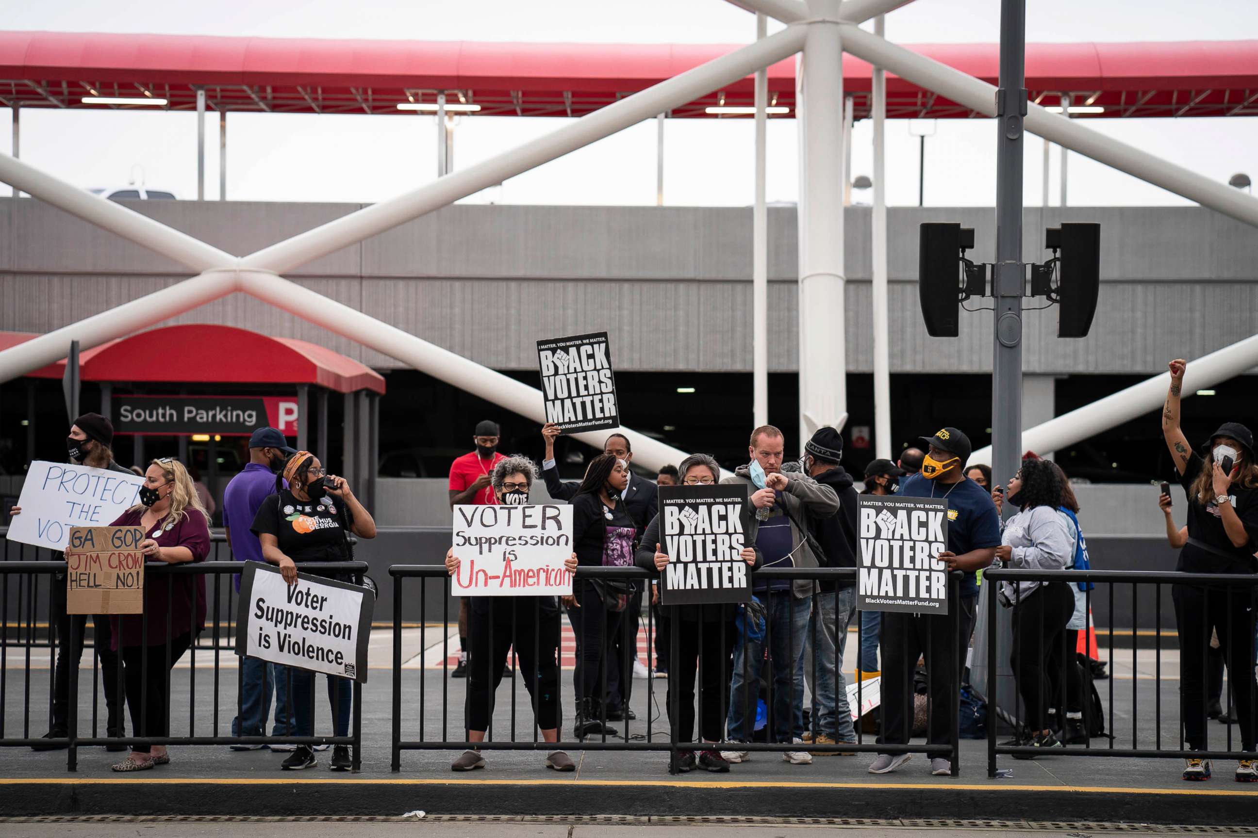 PHOTO: Voting-rights activists call for a boycott of Delta Air Lines during a protest at Hartsfield-Jackson Atlanta International Airport in Atlanta, March 25, 2021.