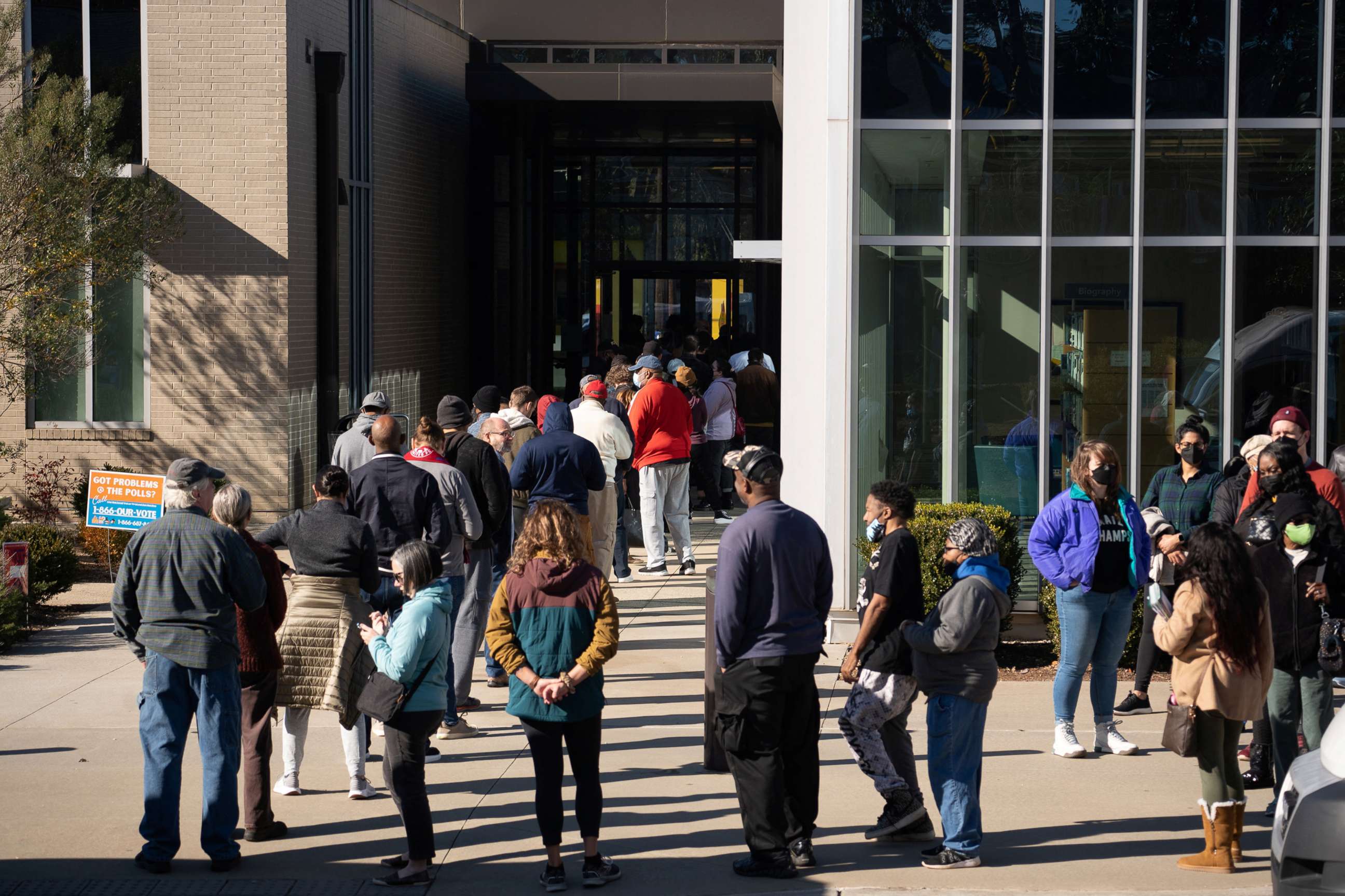 PHOTO: Voters line up at Metropolitan Library to cast their ballots in the runoff election for the Senate position, between Democratic incumbent Raphael Warnock and Republican candidate Herschel Walker, in Atlanta, on Nov. 29, 2022.