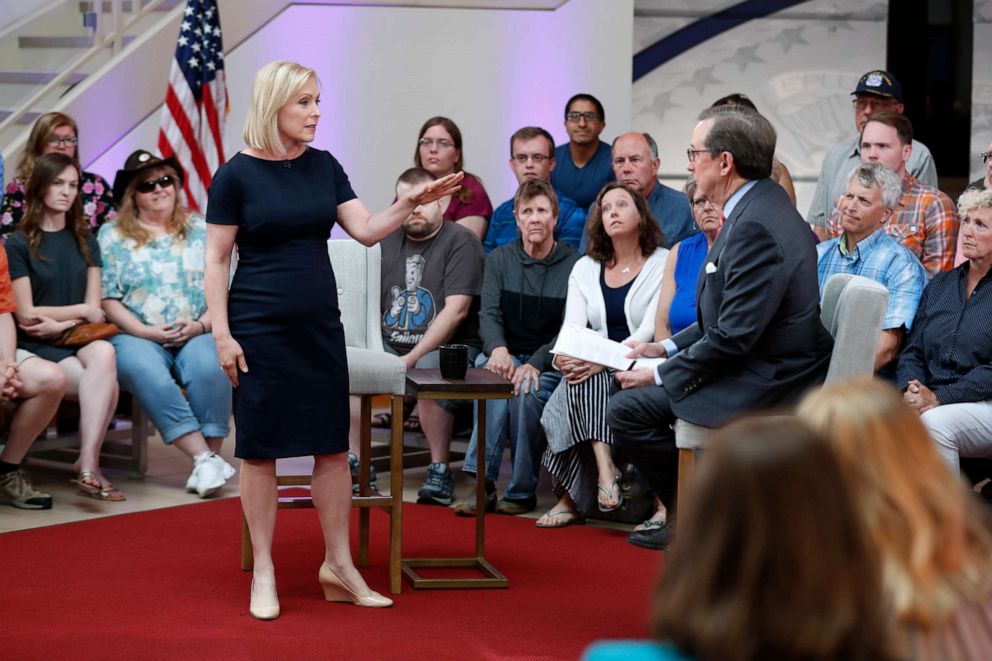 PHOTO: Democratic presidential candidate Sen. Kirsten Gillibrand speaks with FOX News Anchor Chris Wallace, right, during a FOX News town hall, June 2, 2019, in Dubuque, Iowa.