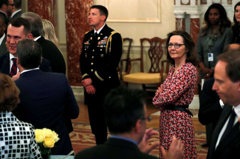 PHOTO: Central Intelligence Agency (CIA) director nominee Gina Haspel, right, attends Secretary of State Mike Pompeo's ceremonial swearing-in at the State Department in Washington, May 2, 2018.