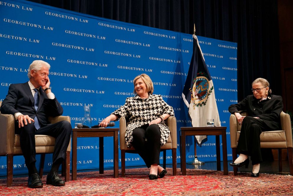PHOTO: Former President Bill Clinton, left, former Secretary of State Hillary Clinton, and Supreme Court Justice Ruth Bader Ginsberg take their seats to speak, Oct. 30, 2019, at Georgetown Law's second annual Ruth Bader Ginsburg Lecture, in Washington.