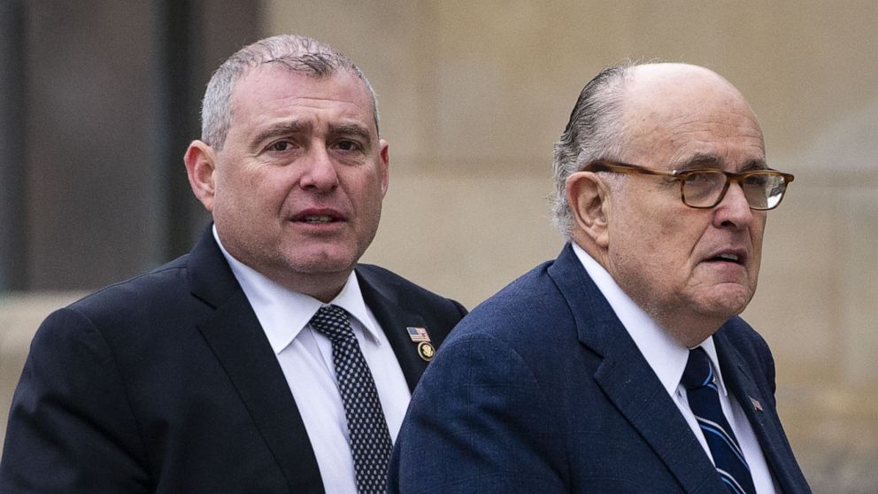 PHOTO: Rudy Giuliani arrives with his associate Lev Parnas before a state funeral service for former President George H.W. Bush at the National Cathedral in Washington, D.C., U.S., on Wednesday, Dec. 5, 2018.