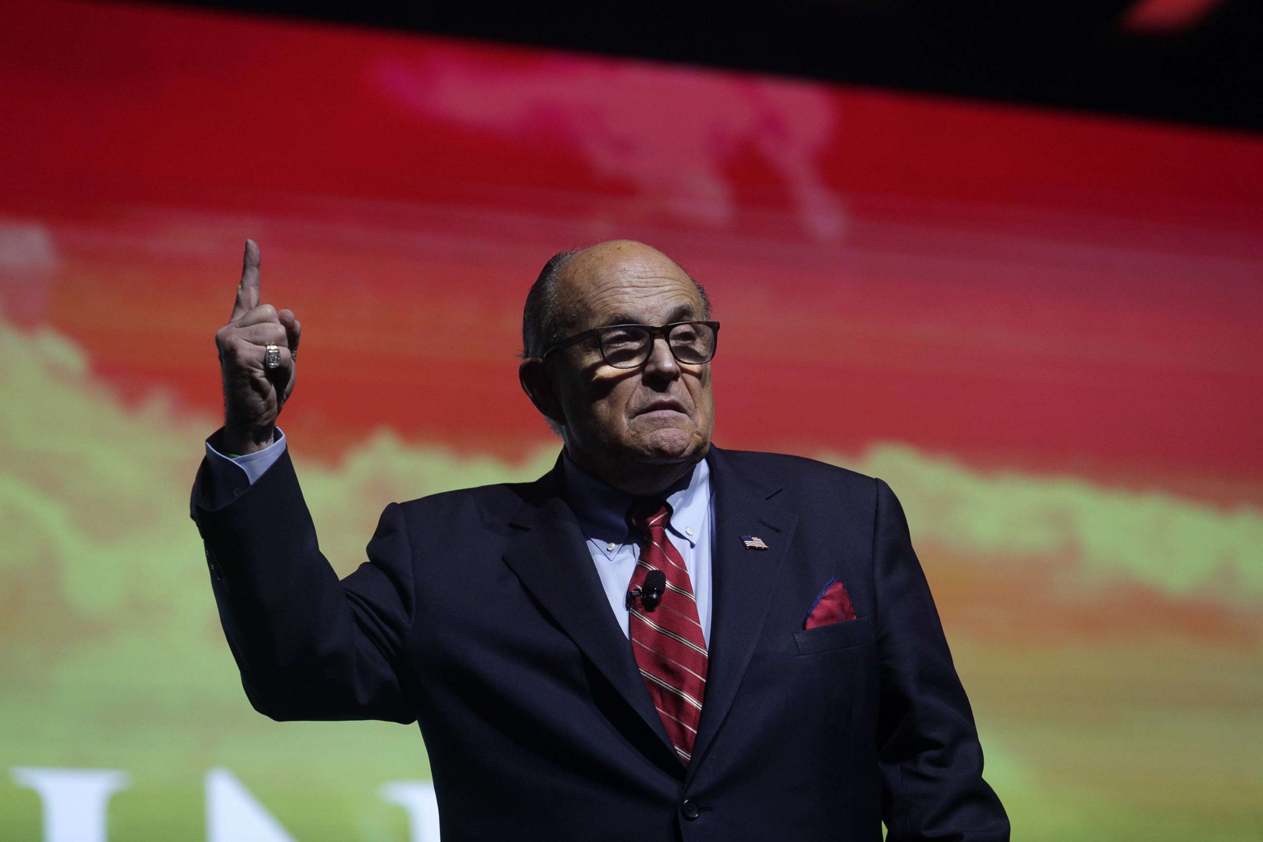PHOTO: Trump Attorney Rudy Giuliani addresses the crowd at the Turning Point USA Student Action Summit on Dec. 19, 2019 in Palm Beach, Fla.