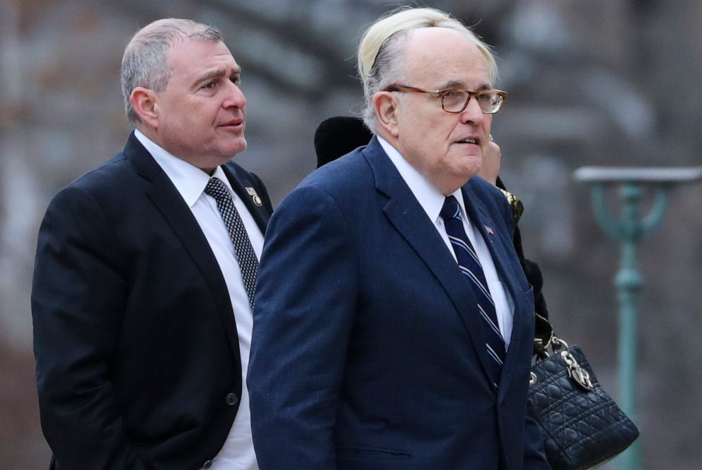 PHOTO: In this Dec. 5, 2018, file photo, Rudy Giuliani and Soviet born business man who served as Giuliani's fixer in Ukraine, Lev Parnas, arrive for the funeral of late President George H.W. Bush at the National Cathedral in Washington.