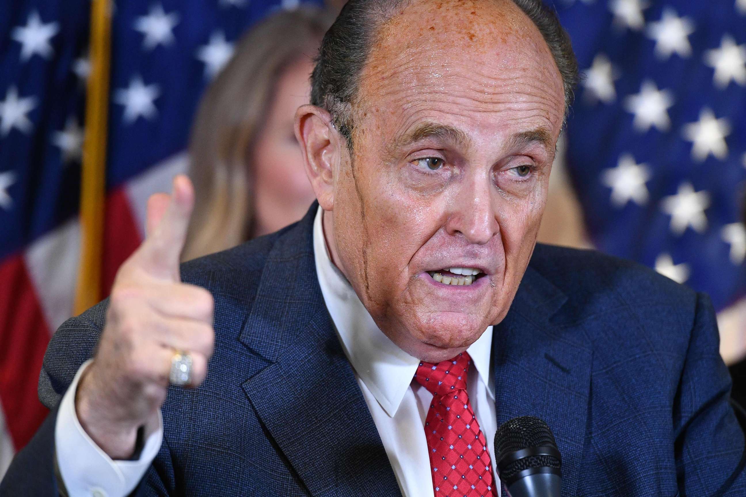 PHOTO: Trump's personal lawyer Rudy Giuliani perspires as he speaks during a press conference at the Republican National Committee headquarters in Washington, D.C., on Nov. 19, 2020.