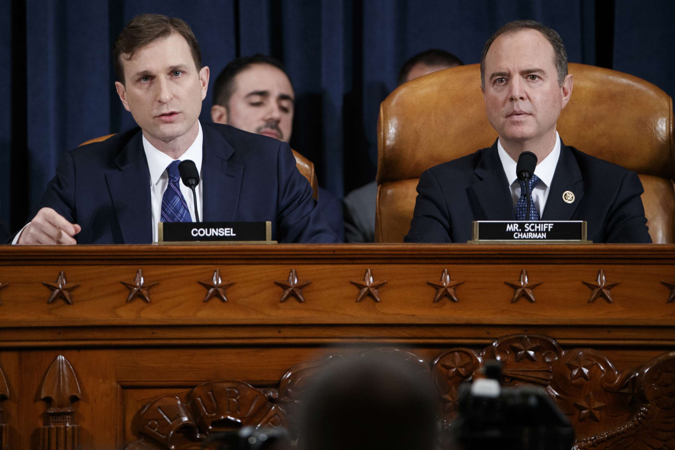 PHOTO: Democratic Counsel Daniel Goldman questions Alexander Vindman and Jennifer Williams, as Chairman Rep. Adam Schiff listens during testimony on Capitol Hill, Nov. 19, 2019 in Washington, D.C.