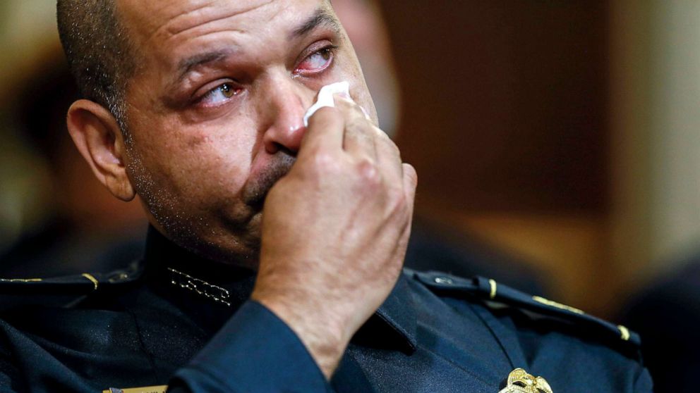 PHOTO: U.S. Capitol Police Sgt. Aquilino Gonell wipes his eye as he watches a video being displayed during a House select committee hearing on the Jan. 6 attack on Capitol Hill in Washington, D.C., July 27, 2021.